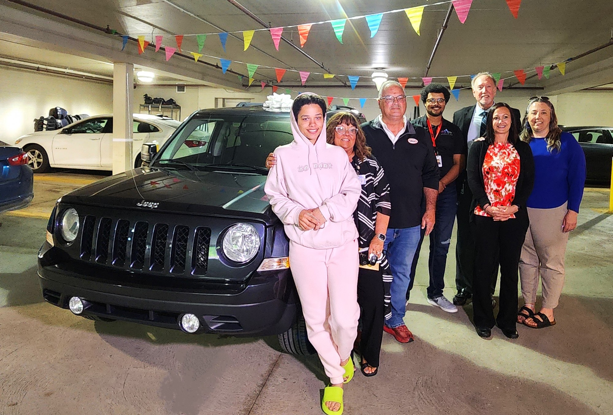 Car dealer gifts car to emancipated foster youth who has been biking to work